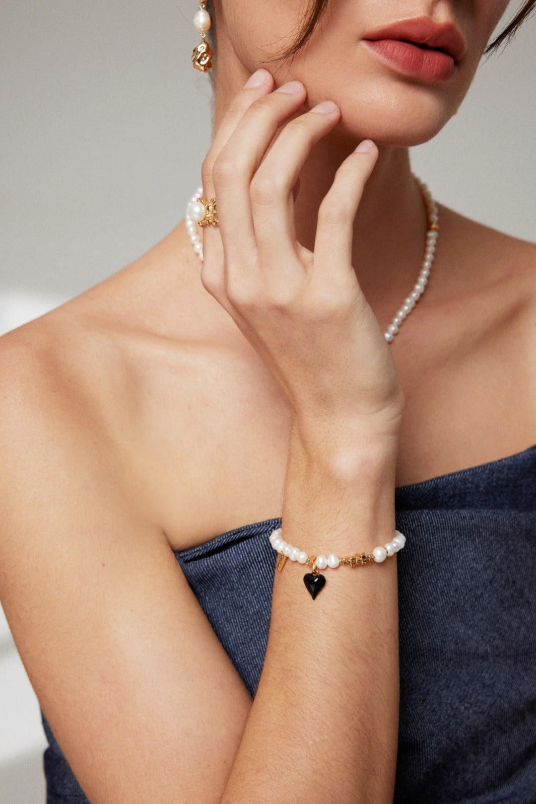 Sterling Silver French Pearl Necklace and Bracelet, featuring a classic heart design