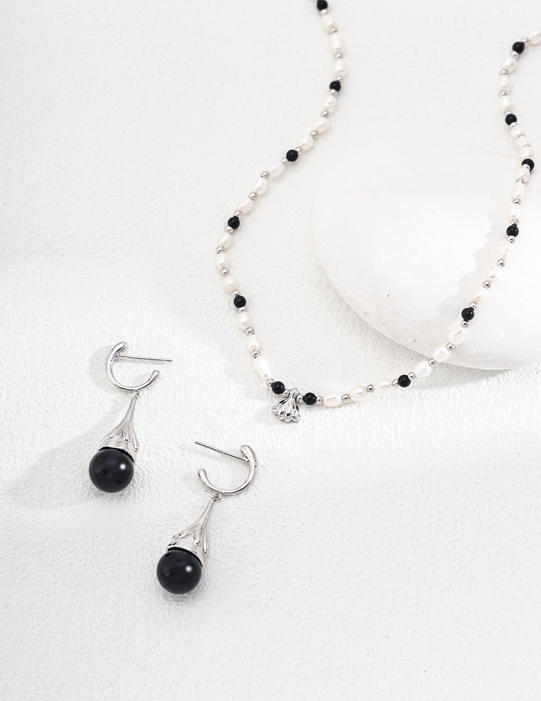 Sterling silver black onyx / tiger’s eye earrings